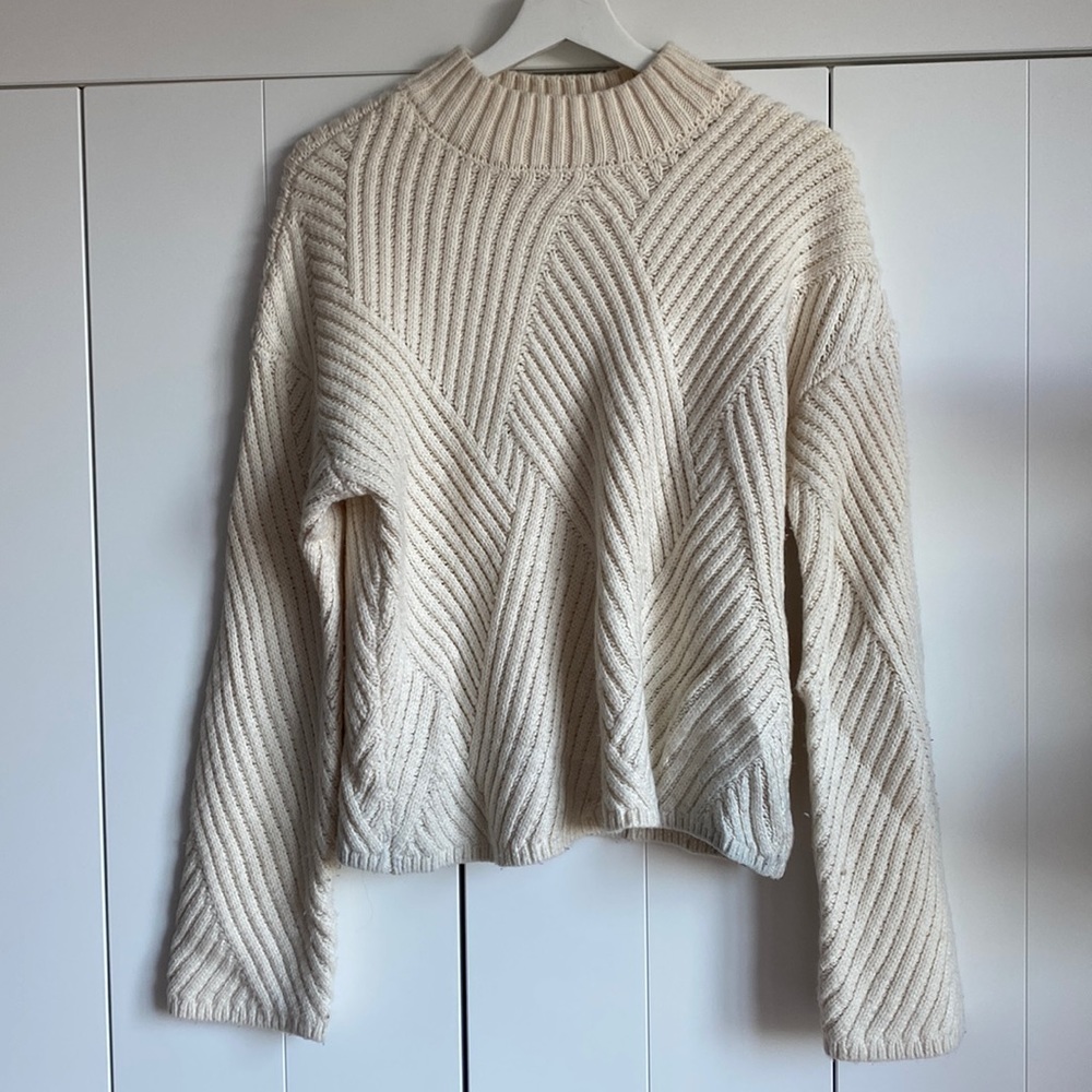 White cable knit sweater